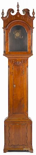 Pennsylvania Chippendale walnut inlaid tall case clock case, having the tympanum inlaid J. H. D. L.