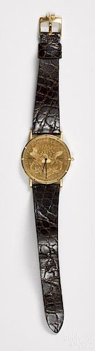 Corum 1899 $20 gold coin watch with a leather band.