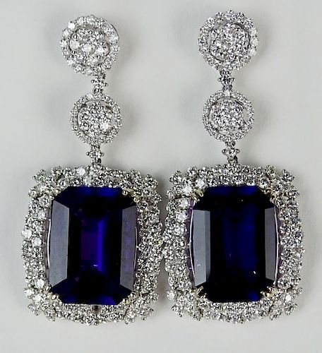 Pair of lady's approx. 22.0 carat gem quality emerald cut amethyst, 6.50 carat round cut diamond and 18 kpendant earrings.