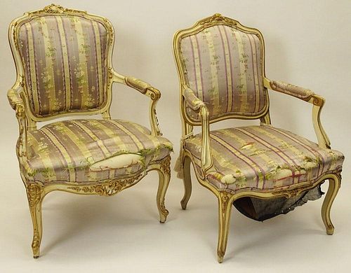 Assembled Pair of 19/20th Century Italian Carved, Painted and Parcel Gilt Wood Open Armchairs.