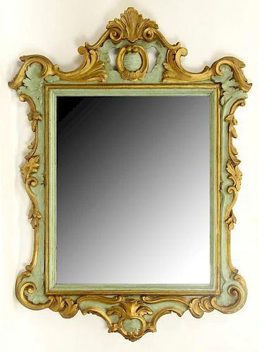Early 20th Century Italian Florentine Carved Painted and Parcel Gilt Mirror.
