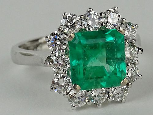 Stone Group Laboratories certified approx. 12.02 carat emerald cut Colombian emerald