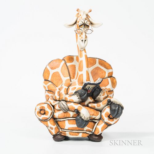 Todd Warner (American, b. 1945) Ceramic Giraffe Reading a Book in a Chair