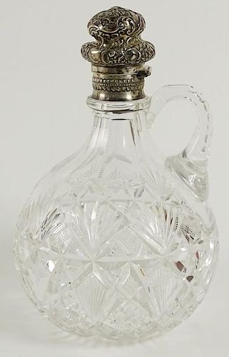 Antique Gorham silver mounted cut crystal claret jug.