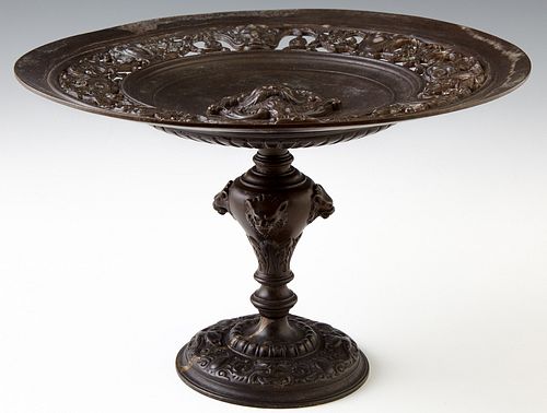 Patinated Bronze Baroque Style Tazza, early 20th c., the pierced concave top with a central relief Northwind face, on a tapered supp...
