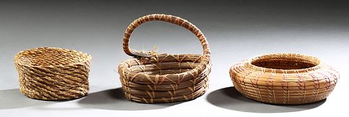 Group of Three Indian Woven Pine Straw Baskets, consisting of an unfinished basket with a leather bottom, a baluster bowl; and a coa...