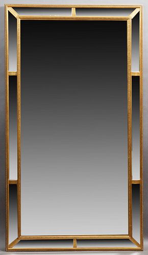 French Gilt Composition Beveled Glass Overmantle Cushion Mirror, early 20th c., the beaded frame around a large beveled glass plate...