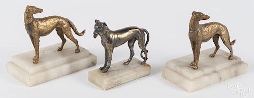 Three patinated white metal dog sculptures, early 20th c., 5 1/2'' h.