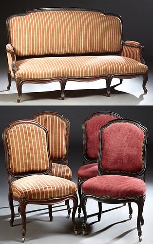 French Louis XV Style Carved Mahogany Five Piece Parlor Suite, late 19th c., consisting of a settee and four side chairs, the settee...