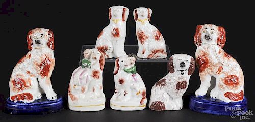 Three pairs of Staffordshire spaniels, 19th c., together with a single spaniel, tallest - 5 1/2''.