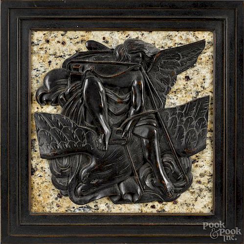 Italian carved mahogany plaque mounted on marble and depicting Ganymede riding Zeus as an eagle