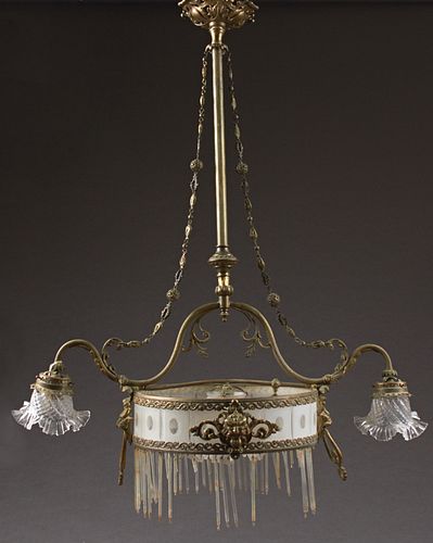 French Bronze and Cut Glass Three Light Chandelier, early 20th c., the pierced canopy issuing a reeded support to two curved arm lig...