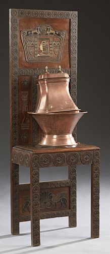 French Copper Lavabo, c. 1900, consisting of a covered reservoir and basin on an ornate Egyptian motif stand with elaborate brass an...