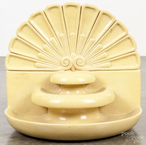 Yellow glazed ceramic fountain, 20th c., 16 1/2'' h., 18 1/4'' w. Provenance: DeHoogh Gallery