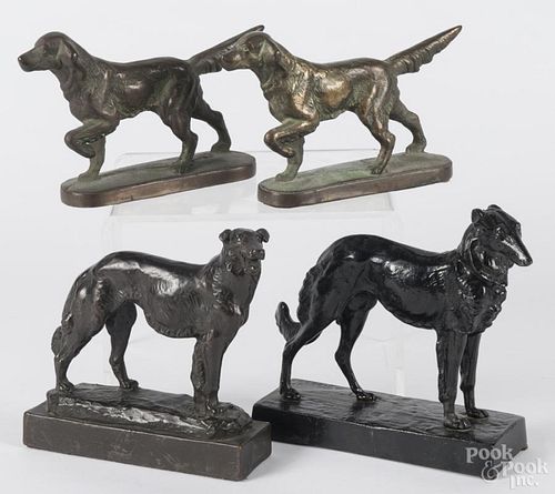 Pair of brass retriever figures, 19th c., together with a cast iron hound figure, signed at base