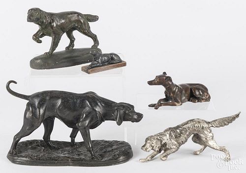 Five assorted dog figures, to include a carved and painted retriever and three metal hound figures.