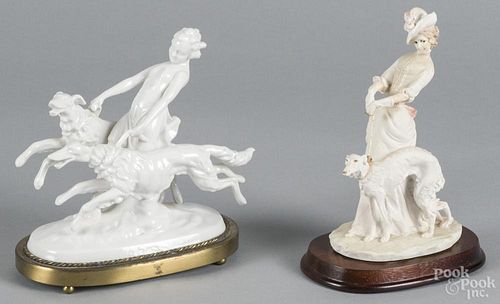 Porcelain figure of a girl and two borzoi hounds on a brass base, 7 1/2'' h.