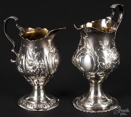 Two Georgian repoussé silver creamers, 1770-1771 and 1775-1776, bearing the touches of Thomas Smith