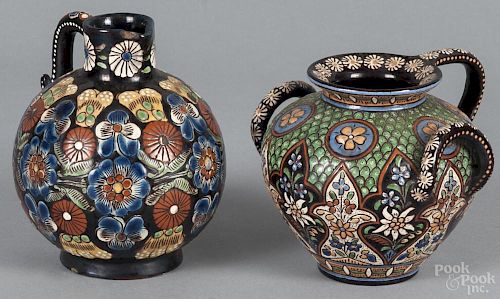 Two Swiss pottery vessels, early 20th c., 5 1/4'' h. and 4 1/2'' h. Provenance: DeHoogh Gallery