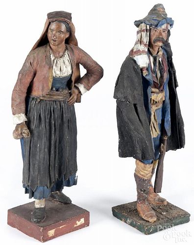 Pair of Italian painted wood and papier-mâché figures of a man and woman, late 19th c., 13'' h.