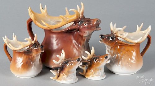 Royal Bayreuth porcelain elk tableware, to include a water pitcher, 7'' h., a milk pitcher, 5 1/4'' h.
