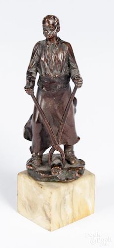 Italian bronze figure of a blacksmith, 20th c., on a marble base, 6 1/2'' h.