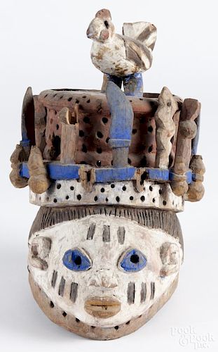 African carved and polychrome painted Yoruba Gelede helmet mask, 11 1/2'' h.