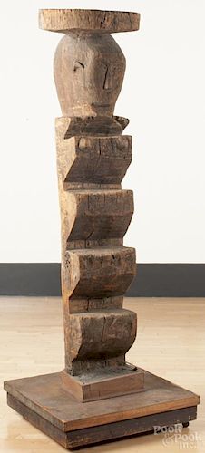 African carved wood shaman's ladder with a stand, 79'' h. Provenance: DeHoogh Gallery, Philadelphia.