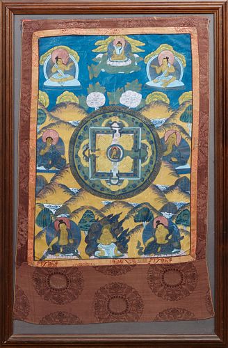 Tibetan Thangka, 19th c., with an embroidered silk border, framed, H.- 32 3/4 in., W.- 20 1/2 in.