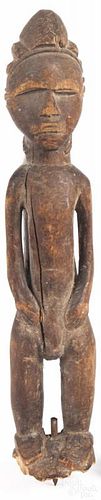 African carved male spirit figure, by the Baule people of the Ivory Coast, 15'' h.