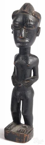 West African carved hermaphrodite figure, 11 1/4'' h. Provenance: DeHoogh Gallery, Philadelphia.