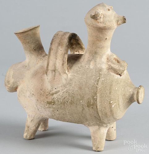 Early Syrian or Anatolian ceramic vessel or rhyton, in the form of a fat-tailed sheep, 12'' h.