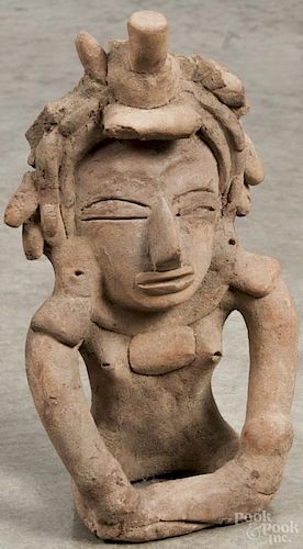 Early seated clay figure, in the Vera Cruz Remojada style, 11 1/2'' h. Provenance: DeHoogh Gallery