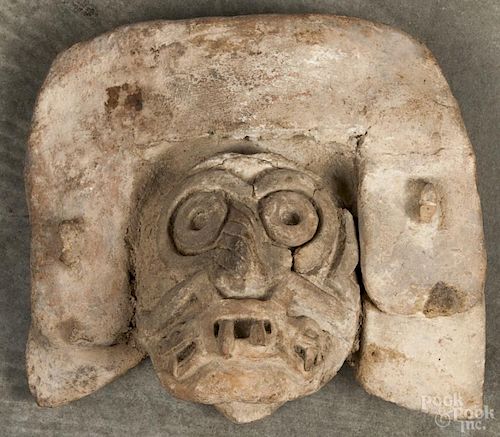 Vera Cruz pre-Columbian ceramic Tlaloc head, 8 1/2'' h., 9 1/2'' w. Provenance: DeHoogh Gallery