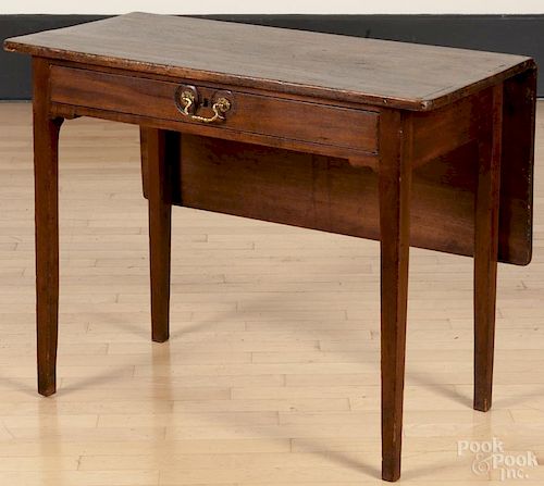 George III mahogany work table, late 18th c., with a single drop leaf, 28'' h., 36'' w.