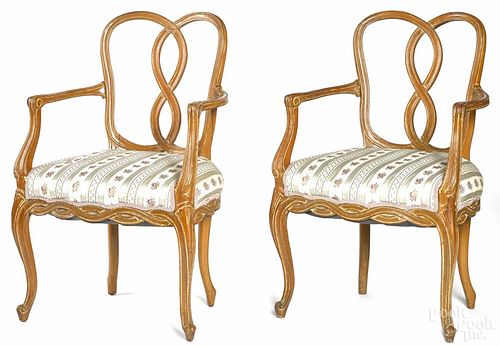 Pair of French carved and painted armchairs, early 20th c.