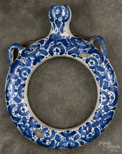 Continental pottery ring flask, 19th c., probably Spanish, 7 3/4'' dia. Provenance: DeHoogh Gallery