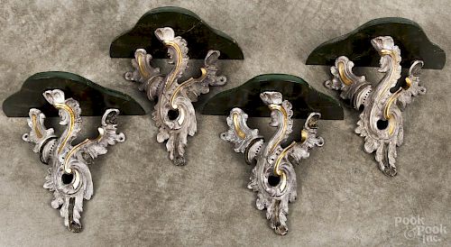 Set of four painted white metal and faux marble wall brackets, 20th c., 10 1/2'' h.