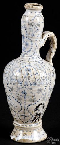Italian pottery ewer, 19th c., with cobalt and incised decoration, 10'' h. Provenance: DeHoogh Gallery