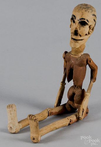 Carved and painted emaciated figure, early 20th c., probably southwest, 29'' h.