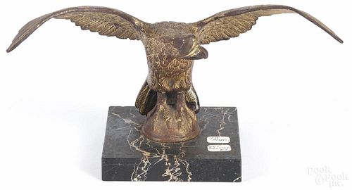 Gilt bronze eagle finial, late 19th c., 5 1/4'' h., 10 1/2'' w. Provenance: DeHoogh Gallery