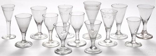 Thirteen blown glass cordials, early 19th c., to include etched and clear examples.