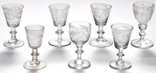 Six blown glass cordials, 18th/19th c., of similar form with wafer stems and etched decoration