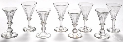 Set of four blown glass cordials, 19th c., together with four pieces of similar form.