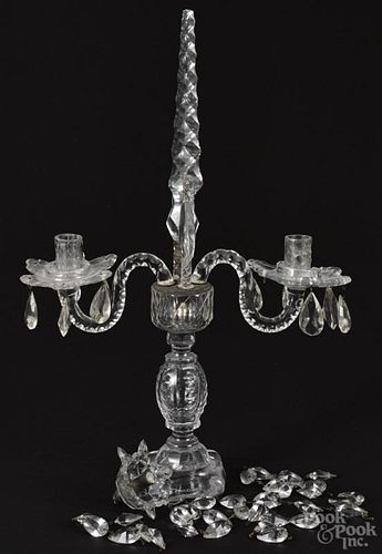 Crystal two-arm candleholder, 19'' h., together with a reproduction hanging shelf, 8 3/4'' h., 11'' w.