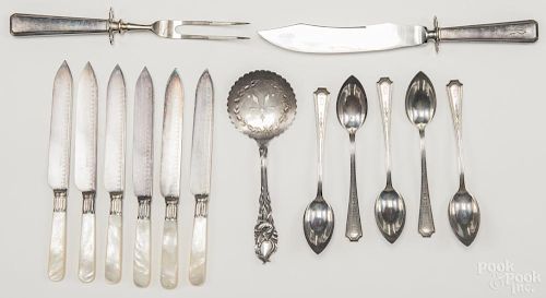 Five William B. Durgin Co. sterling silver melon spoons, together with a sterling handled meat set