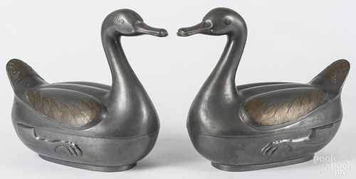 Pair of Chinese pewter and brass mounted duck tureens, 20th c., 11 1/2'' h., 14 1/2'' w.