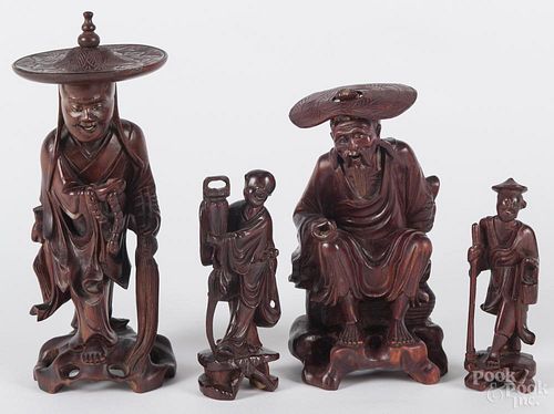Four Chinese carved hardwood figures, tallest - 10''.