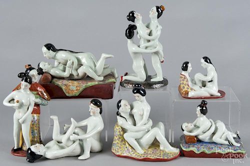Seven Chinese porcelain erotic figural groups, stamped on bases, tallest - 10''.