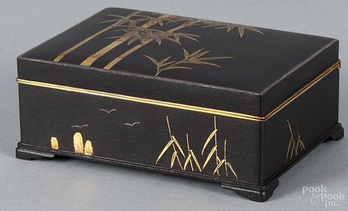 Japanese iron box with gold and shakudo details, likely Meiji period
